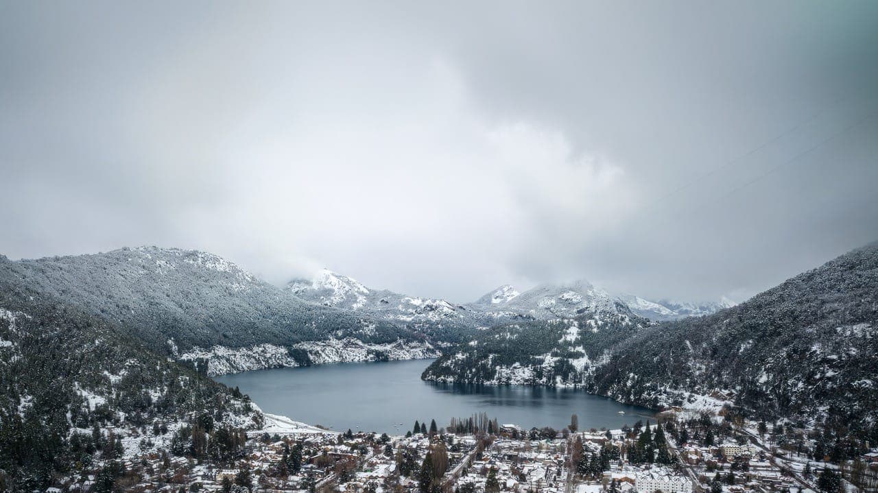 The lake and the snow-covered mountains in winter